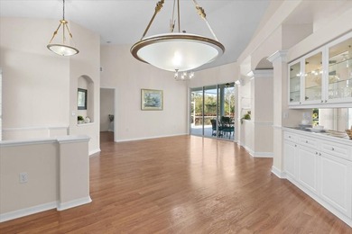 Tucked away among tree-lined streets and mature landscaping in on River Wilderness Golf and Country Club in Florida - for sale on GolfHomes.com, golf home, golf lot