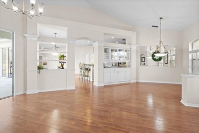 Tucked away among tree-lined streets and mature landscaping in on River Wilderness Golf and Country Club in Florida - for sale on GolfHomes.com, golf home, golf lot