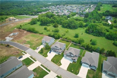 Commercial land with house and barn that has gone through the on Lakeside Hills Golf Course in Kansas - for sale on GolfHomes.com, golf home, golf lot