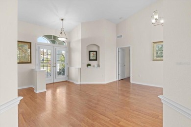 Tucked away among tree-lined streets and mature landscaping in on River Wilderness Golf and Country Club in Florida - for sale on GolfHomes.com, golf home, golf lot