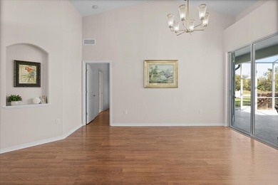 Tucked away among tree-lined streets and mature landscaping in on River Wilderness Golf and Country Club in Florida - for sale on GolfHomes.com, golf home, golf lot