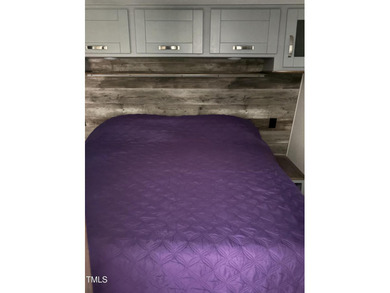 Beautiful cleared multi-use lot on the south side of Lake Royale on River Golf and Country Club at Lake Royale in North Carolina - for sale on GolfHomes.com, golf home, golf lot