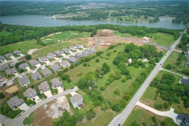 Commercial land with house and barn that has gone through the on Lakeside Hills Golf Course in Kansas - for sale on GolfHomes.com, golf home, golf lot