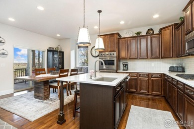 Set on a generous corner lot in Highland Meadows Golf Course on Highland Meadows Golf Course in Colorado - for sale on GolfHomes.com, golf home, golf lot