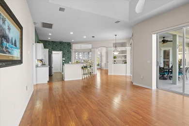 Tucked away among tree-lined streets and mature landscaping in on River Wilderness Golf and Country Club in Florida - for sale on GolfHomes.com, golf home, golf lot