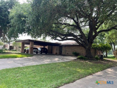 Welcome to your dream home-an exquisite mid-century modern on Victoria Country Club in Texas - for sale on GolfHomes.com, golf home, golf lot
