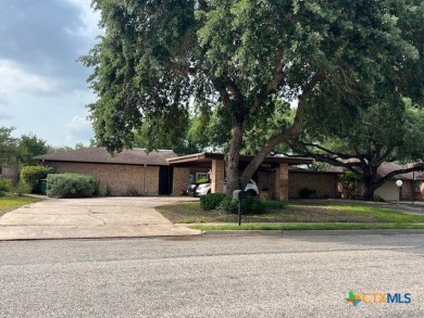 Welcome to your dream home-an exquisite mid-century modern on Victoria Country Club in Texas - for sale on GolfHomes.com, golf home, golf lot