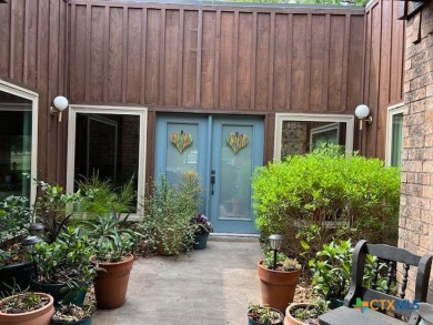 Welcome to your dream home-an exquisite mid-century modern on Victoria Country Club in Texas - for sale on GolfHomes.com, golf home, golf lot