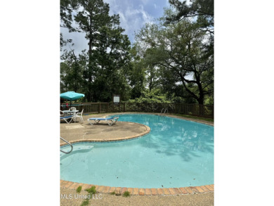 Nice move-in ready condo on 2nd floor in Lakeside Villa. Unit on Diamondhead Country Club in Mississippi - for sale on GolfHomes.com, golf home, golf lot