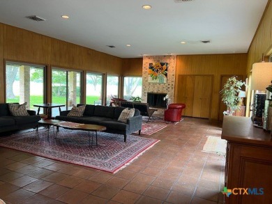 Welcome to your dream home-an exquisite mid-century modern on Victoria Country Club in Texas - for sale on GolfHomes.com, golf home, golf lot