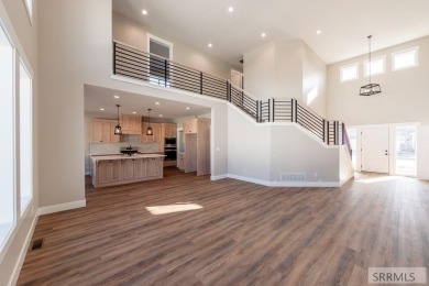 Situated on 0.29 acres, its brand-new faade exudes modern on Sage Lakes Municipal Golf Course in Idaho - for sale on GolfHomes.com, golf home, golf lot