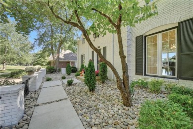 EXPERIENCE RESORT-STYLE LIVING IN THIS FULLY REMODELED 1.5 STORY on Leawood South Country Club in Kansas - for sale on GolfHomes.com, golf home, golf lot