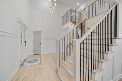 EXPERIENCE RESORT-STYLE LIVING IN THIS FULLY REMODELED 1.5 STORY on Leawood South Country Club in Kansas - for sale on GolfHomes.com, golf home, golf lot