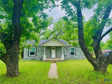 Step into this beautifully painted 2 bedroom, 1 bath rock on Gatesville Country Club in Texas - for sale on GolfHomes.com, golf home, golf lot
