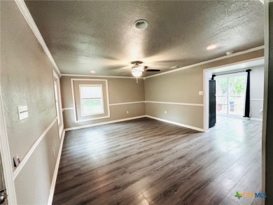 Step into this beautifully painted 2 bedroom, 1 bath rock on Gatesville Country Club in Texas - for sale on GolfHomes.com, golf home, golf lot