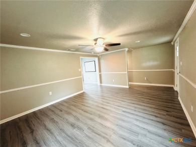 Step into this beautifully painted 2 bedroom, 1 bath rock on Gatesville Country Club in Texas - for sale on GolfHomes.com, golf home, golf lot