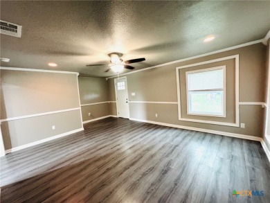 Step into this beautifully painted 2 bedroom, 1 bath rock on Gatesville Country Club in Texas - for sale on GolfHomes.com, golf home, golf lot