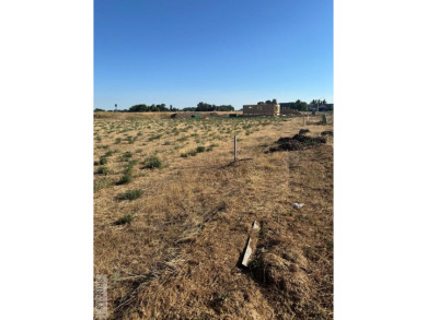 Great central location with mountain views and Idaho sunsets in on Teton Lakes Golf Courses in Idaho - for sale on GolfHomes.com, golf home, golf lot