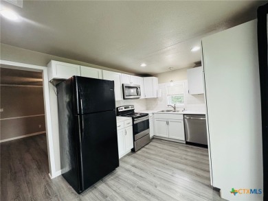 Step into this beautifully painted 2 bedroom, 1 bath rock on Gatesville Country Club in Texas - for sale on GolfHomes.com, golf home, golf lot
