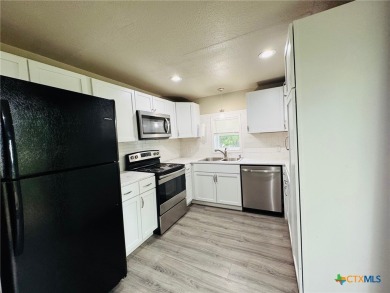 Step into this beautifully painted 2 bedroom, 1 bath rock on Gatesville Country Club in Texas - for sale on GolfHomes.com, golf home, golf lot
