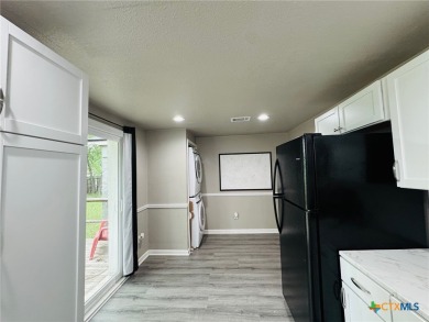 Step into this beautifully painted 2 bedroom, 1 bath rock on Gatesville Country Club in Texas - for sale on GolfHomes.com, golf home, golf lot