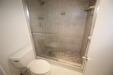 NESTLED IN ONE OF PALM AIRE COUNTRY CLUB'S MOST DESIRABLE on Palm-Aire Country Club and Resort - The Oaks in Florida - for sale on GolfHomes.com, golf home, golf lot