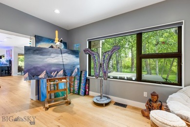 Inspired design that harmonizes modern luxury within nature's on Cottonwood Hills Golf Course - Cottonwood Hills in Montana - for sale on GolfHomes.com, golf home, golf lot