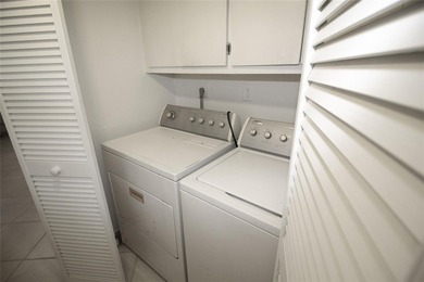 NESTLED IN ONE OF PALM AIRE COUNTRY CLUB'S MOST DESIRABLE on Palm-Aire Country Club and Resort - The Oaks in Florida - for sale on GolfHomes.com, golf home, golf lot