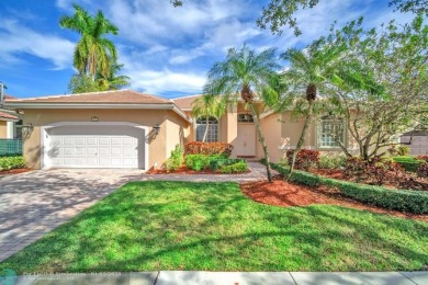 Don't miss out on this move-in ready Weston Hills home! Located on Weston Hills Country Club in Florida - for sale on GolfHomes.com, golf home, golf lot