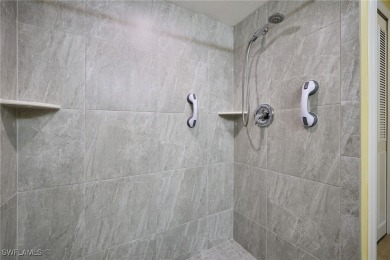 Discover comfort and convenience in this delightful 1st floor 2 on Cypress Lake Country Club in Florida - for sale on GolfHomes.com, golf home, golf lot