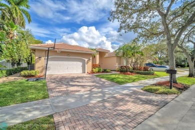 Don't miss out on this move-in ready Weston Hills home! Located on Weston Hills Country Club in Florida - for sale on GolfHomes.com, golf home, golf lot