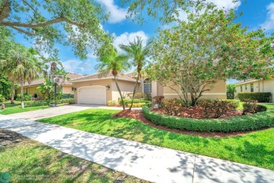 Don't miss out on this move-in ready Weston Hills home! Located on Weston Hills Country Club in Florida - for sale on GolfHomes.com, golf home, golf lot