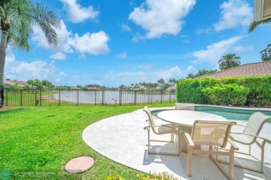 Don't miss out on this move-in ready Weston Hills home! Located on Weston Hills Country Club in Florida - for sale on GolfHomes.com, golf home, golf lot