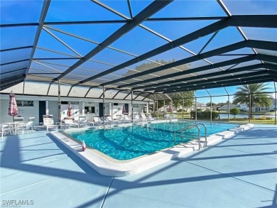 Discover comfort and convenience in this delightful 1st floor 2 on Cypress Lake Country Club in Florida - for sale on GolfHomes.com, golf home, golf lot