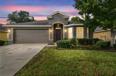 Beautifully maintained and decorated with style, this on Meadow Oaks Golf and Country Club in Florida - for sale on GolfHomes.com, golf home, golf lot