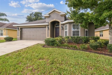 Beautifully maintained and decorated with style, this on Meadow Oaks Golf and Country Club in Florida - for sale on GolfHomes.com, golf home, golf lot