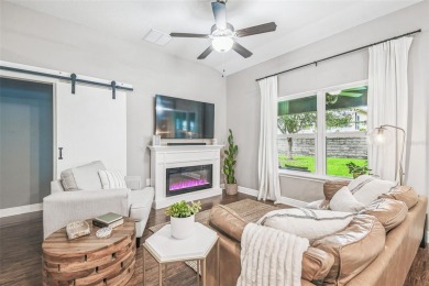 Beautifully maintained and decorated with style, this on Meadow Oaks Golf and Country Club in Florida - for sale on GolfHomes.com, golf home, golf lot