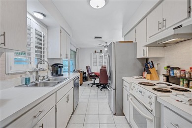 Welcome to this charming single-family home tucked away on a on Highland Lakes Executive Golf Course in Florida - for sale on GolfHomes.com, golf home, golf lot