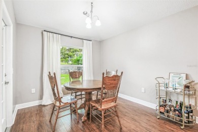 Beautifully maintained and decorated with style, this on Meadow Oaks Golf and Country Club in Florida - for sale on GolfHomes.com, golf home, golf lot