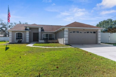 Welcome home to this BEAUTIFULLY MAINTAINED three-bedroom on Spring Hill Golf Course in Florida - for sale on GolfHomes.com, golf home, golf lot