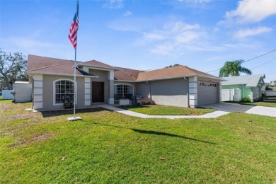 Welcome home to this BEAUTIFULLY MAINTAINED three-bedroom on Spring Hill Golf Course in Florida - for sale on GolfHomes.com, golf home, golf lot