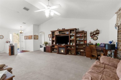 Welcome home to this BEAUTIFULLY MAINTAINED three-bedroom on Spring Hill Golf Course in Florida - for sale on GolfHomes.com, golf home, golf lot
