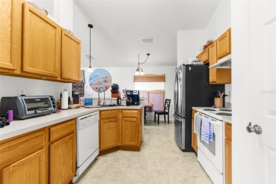 Welcome home to this BEAUTIFULLY MAINTAINED three-bedroom on Spring Hill Golf Course in Florida - for sale on GolfHomes.com, golf home, golf lot