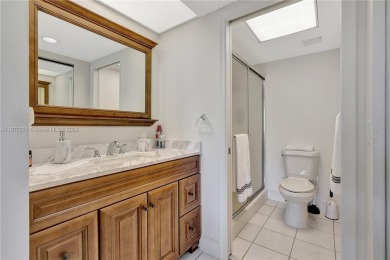 Enjoy beautiful golf course views from the large screened porch on Flamingo Lakes Country Club in Florida - for sale on GolfHomes.com, golf home, golf lot
