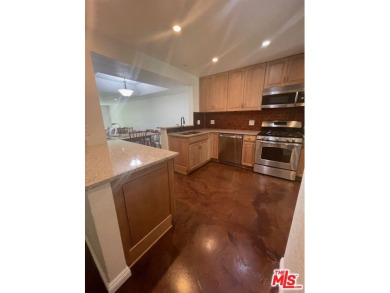 Coveted Gated community Finisterra On The Green, On the Golf on Casta del Sol Golf Course in California - for sale on GolfHomes.com, golf home, golf lot