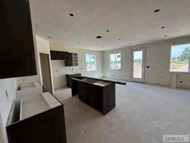Prepare to be captivated! This brand-new 2025 twin home (2,824 on Sage Lakes Municipal Golf Course in Idaho - for sale on GolfHomes.com, golf home, golf lot