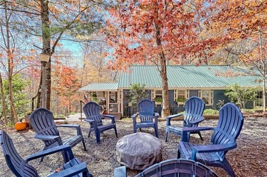 Charming Lake Burton Cottage with Deeded Lake Access - Under on Waterfall Country Club in Georgia - for sale on GolfHomes.com, golf home, golf lot