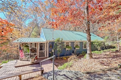Charming Lake Burton Cottage with Deeded Lake Access - Under on Waterfall Country Club in Georgia - for sale on GolfHomes.com, golf home, golf lot