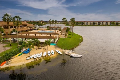 Enjoy beautiful golf course views from the large screened porch on Flamingo Lakes Country Club in Florida - for sale on GolfHomes.com, golf home, golf lot