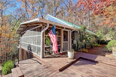 Charming Lake Burton Cottage with Deeded Lake Access - Under on Waterfall Country Club in Georgia - for sale on GolfHomes.com, golf home, golf lot